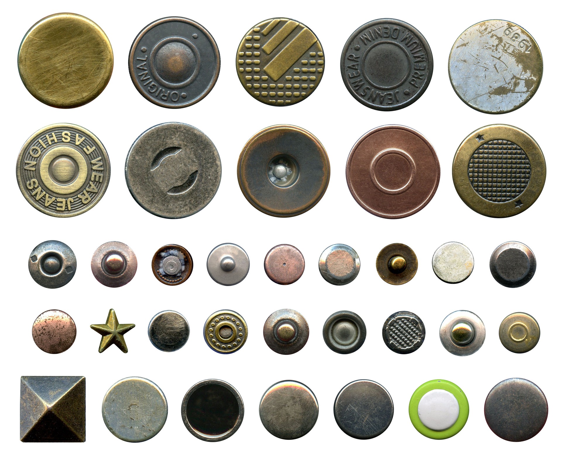 Set of different metal buttons and rivets. Vintage fushion accessories close-up isolated on a white background. Denim culcure modern style